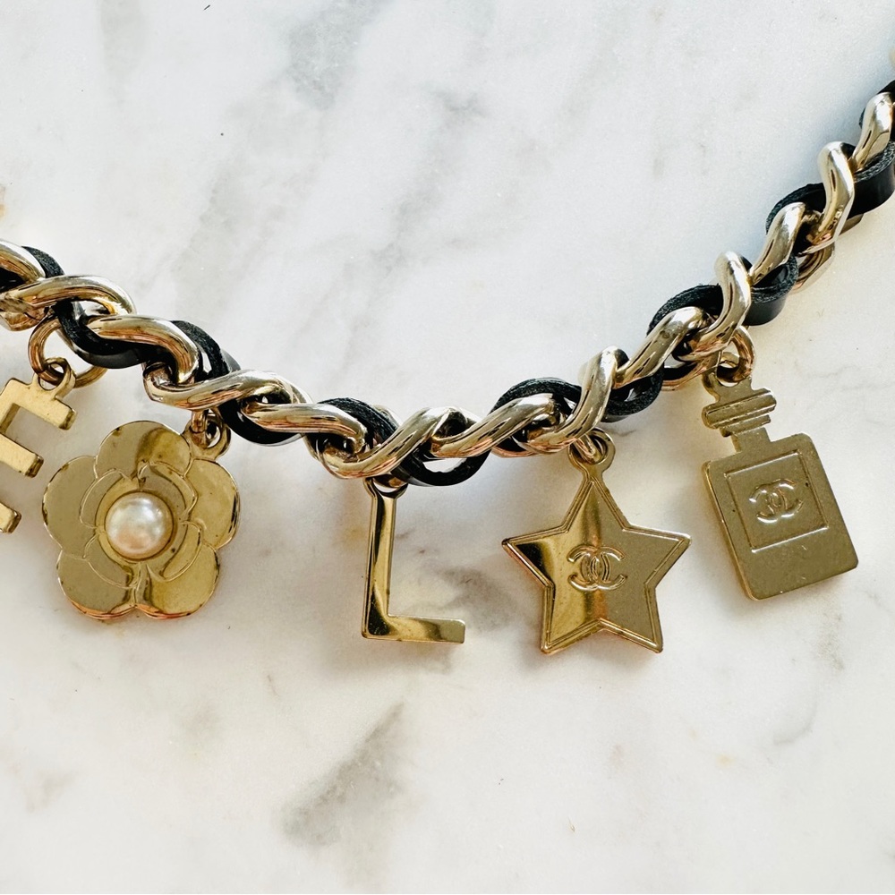 CHANEL Lambskin Crystal CC Logo Charming Necklace in Gold and Black